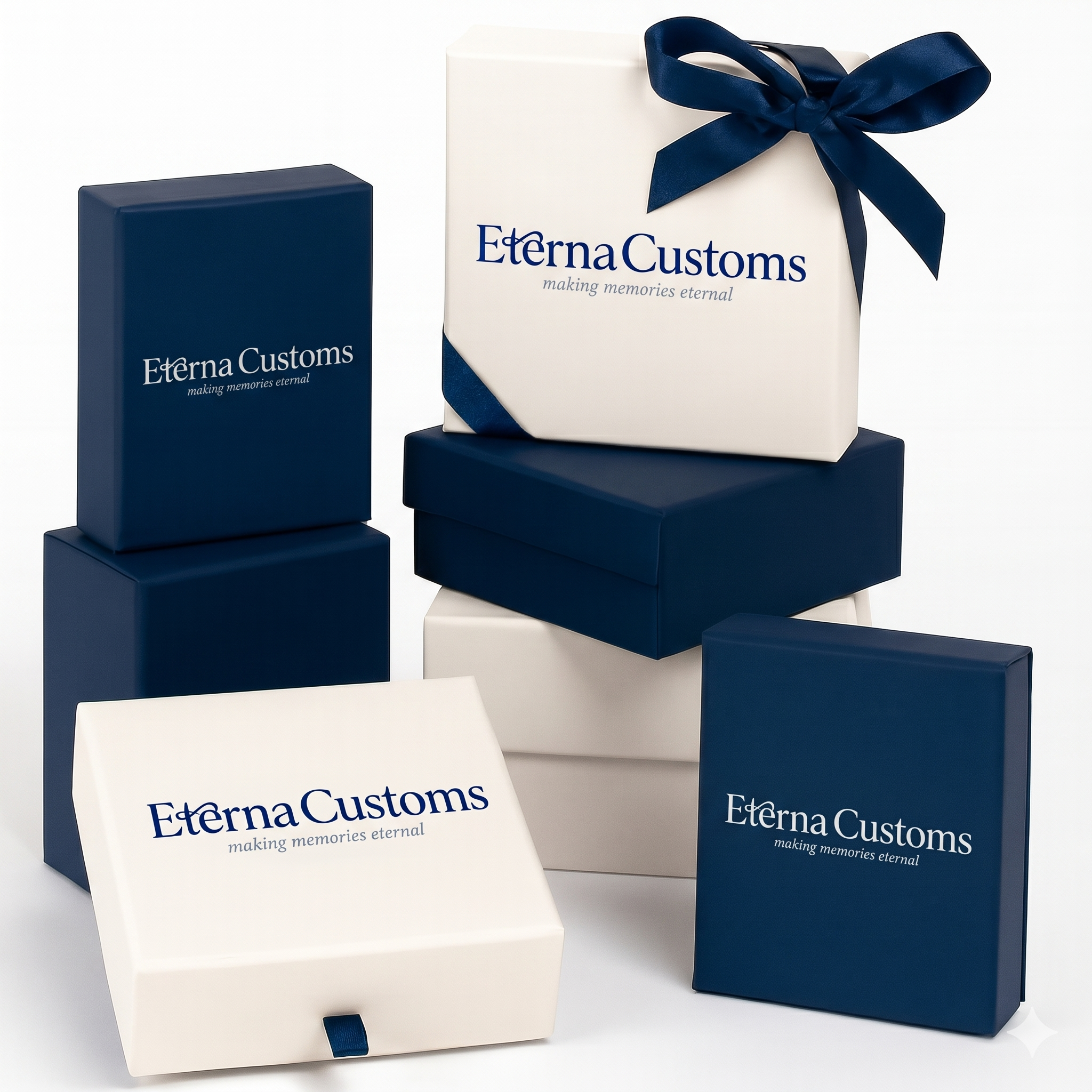 an array of Eterna Customs branded gift boxes in white and blue, one with a ribbon and bow