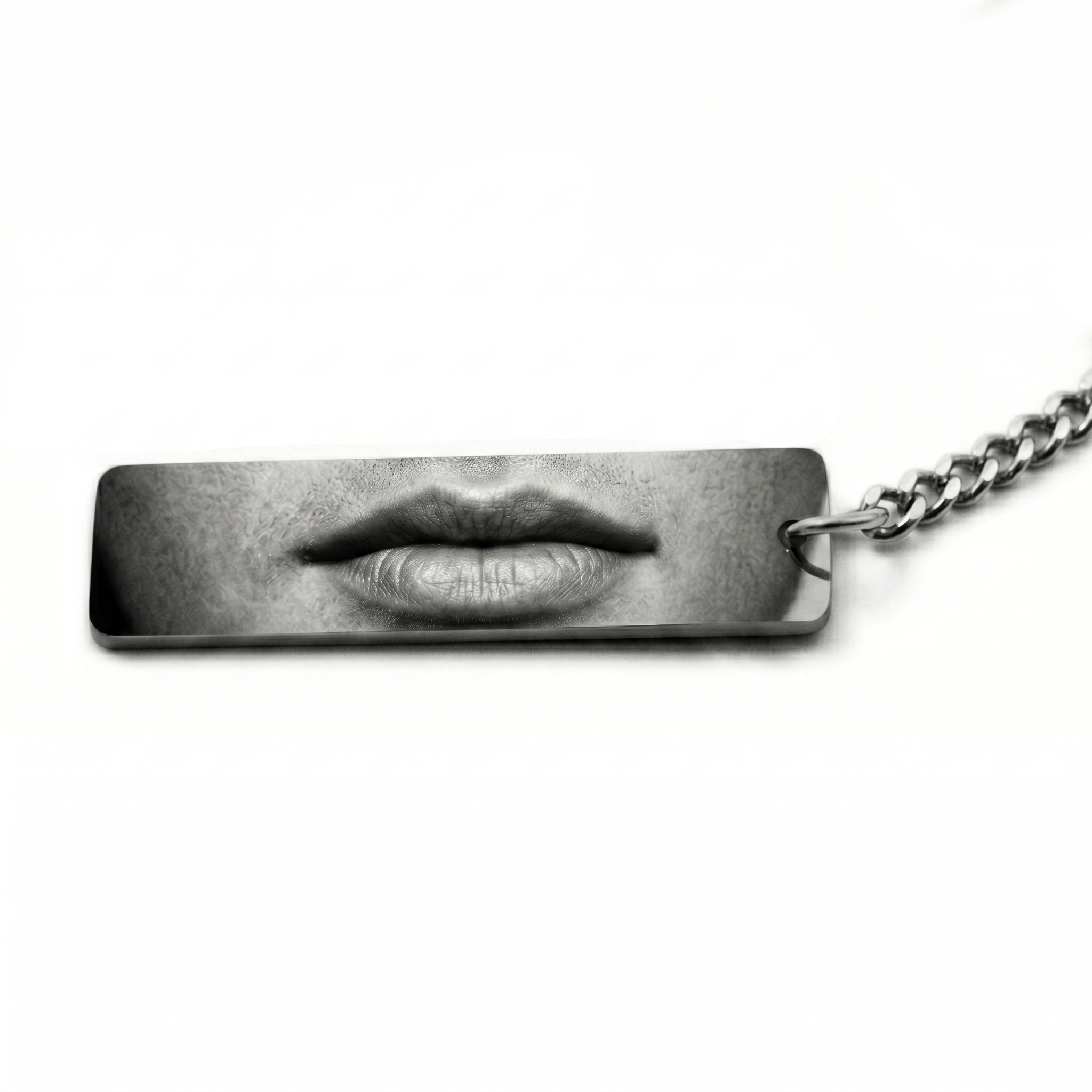 keychain featuring a printed image of a mans lips