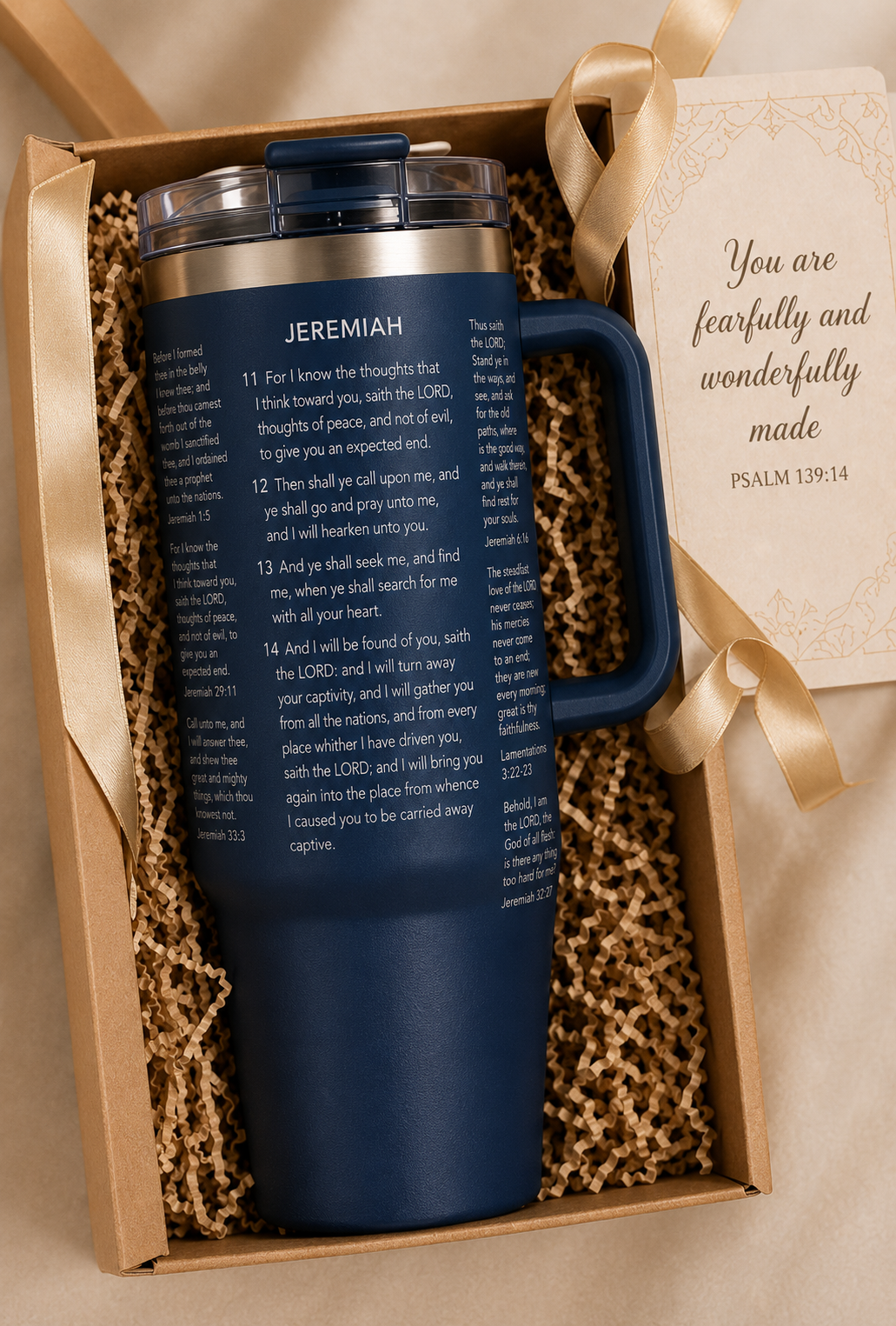a navy blue tumbler engraved with the entirety of a bible verse