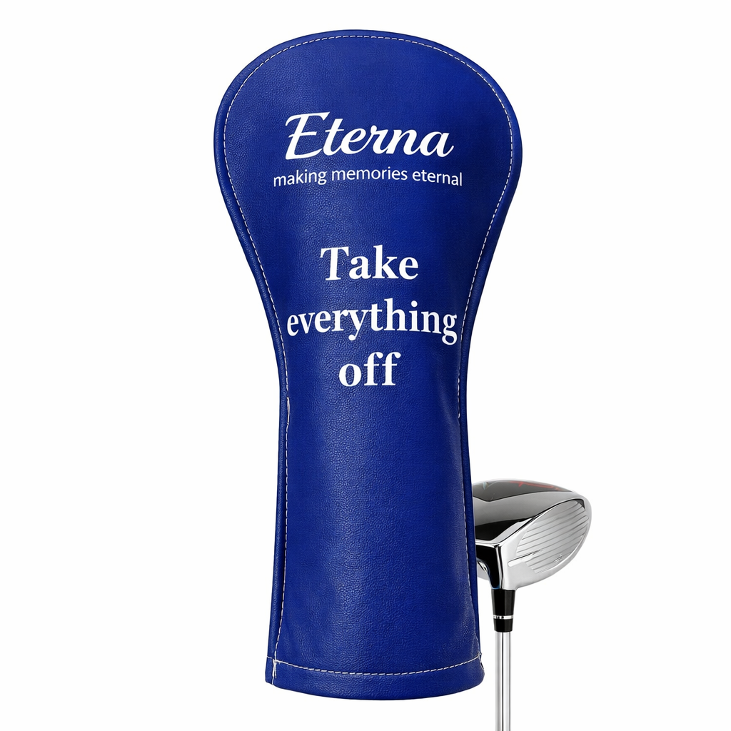 a golf head cover in royal blue with the Eterna logo and custom text that reads "Take everything off"