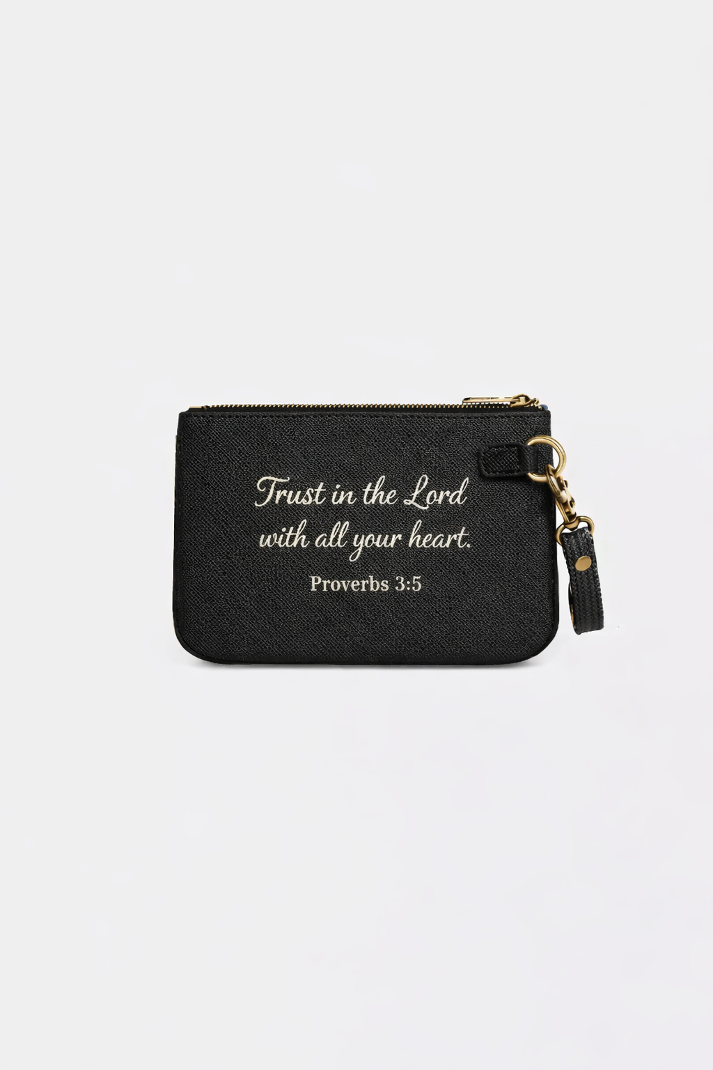 a black leather coin purse featuring a bible verse that reads "Trust in the Lord with all your heart. Proverbs 3:5" the customer has the option to choose any bible verse that speaks to them