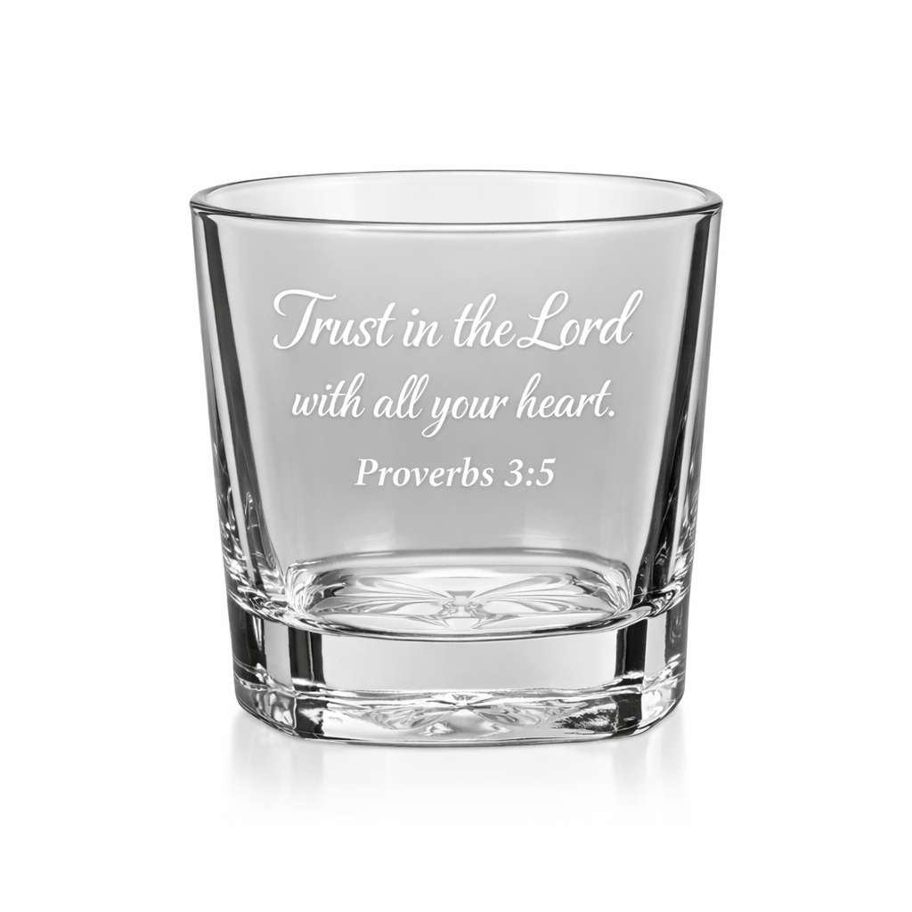 a short glass with an etching of a bible verse, "trust in the lord with all your heart, proverbs 3:5"