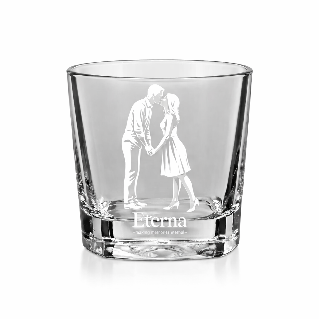 a short glass with an image etching-- a man and woman standing together holding hands