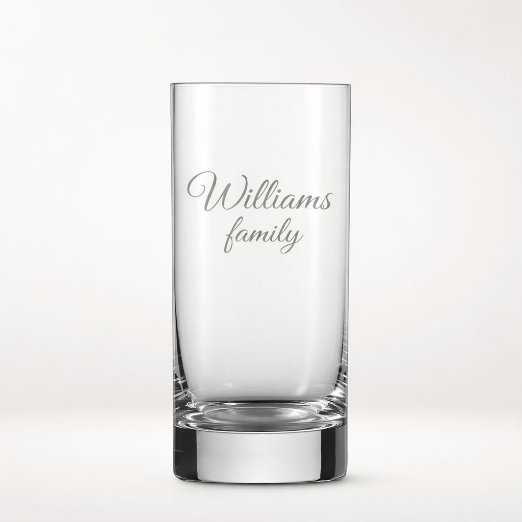 a glass cup with text etching "williams family"
