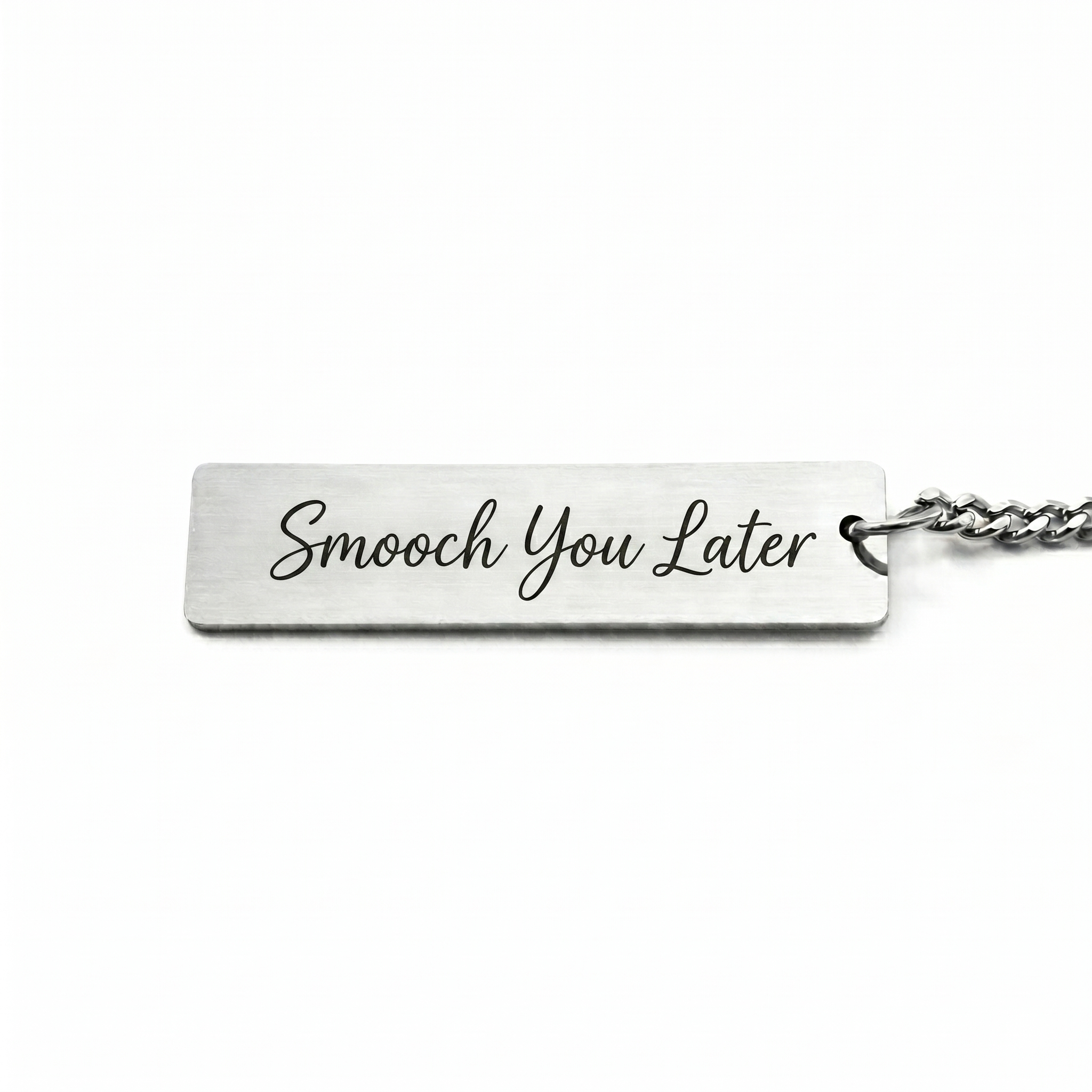 custom text on the back of a keychain in a casual script font that reads "smooch you later"