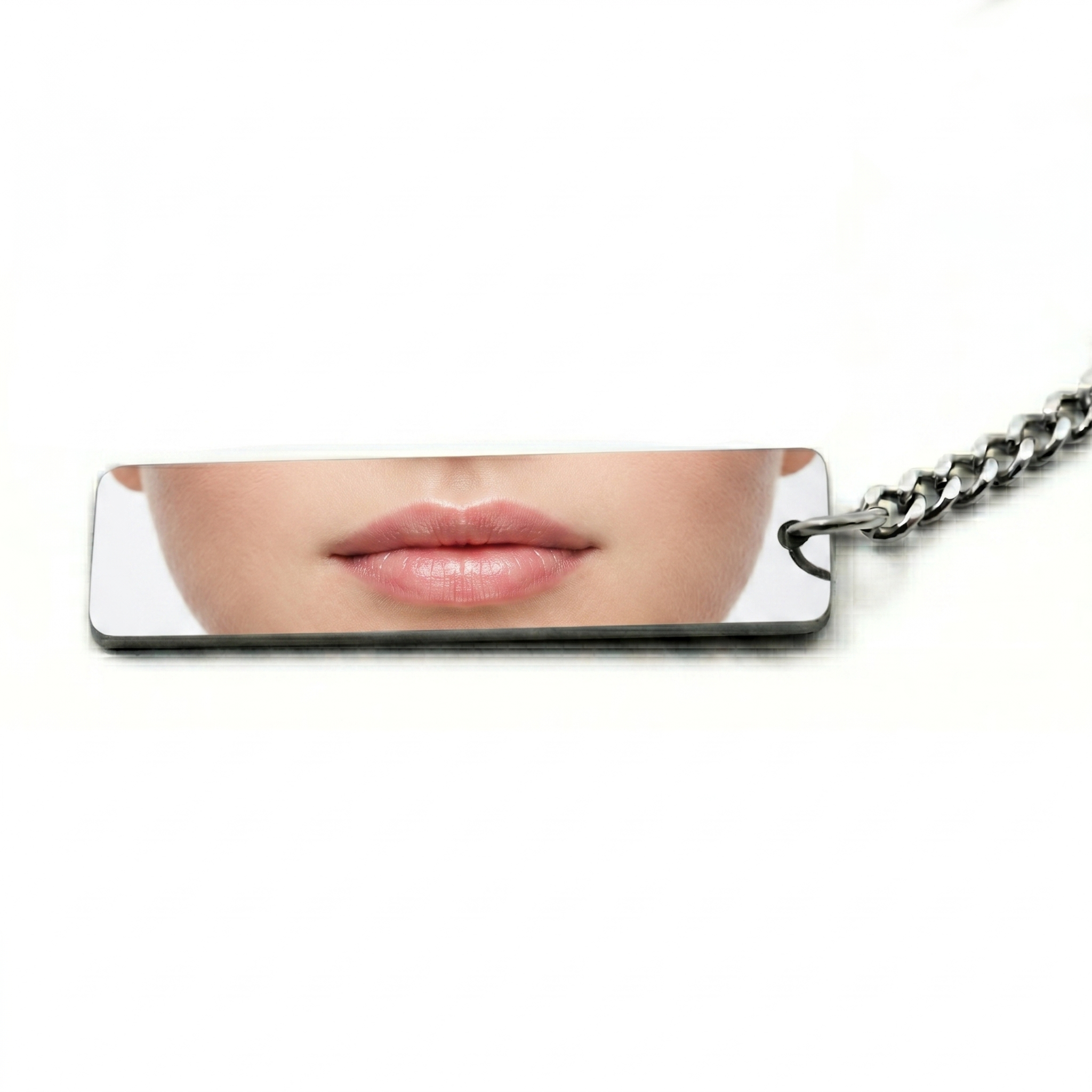 a keychain featuring a printed photo of a woman's lips in vibrant color